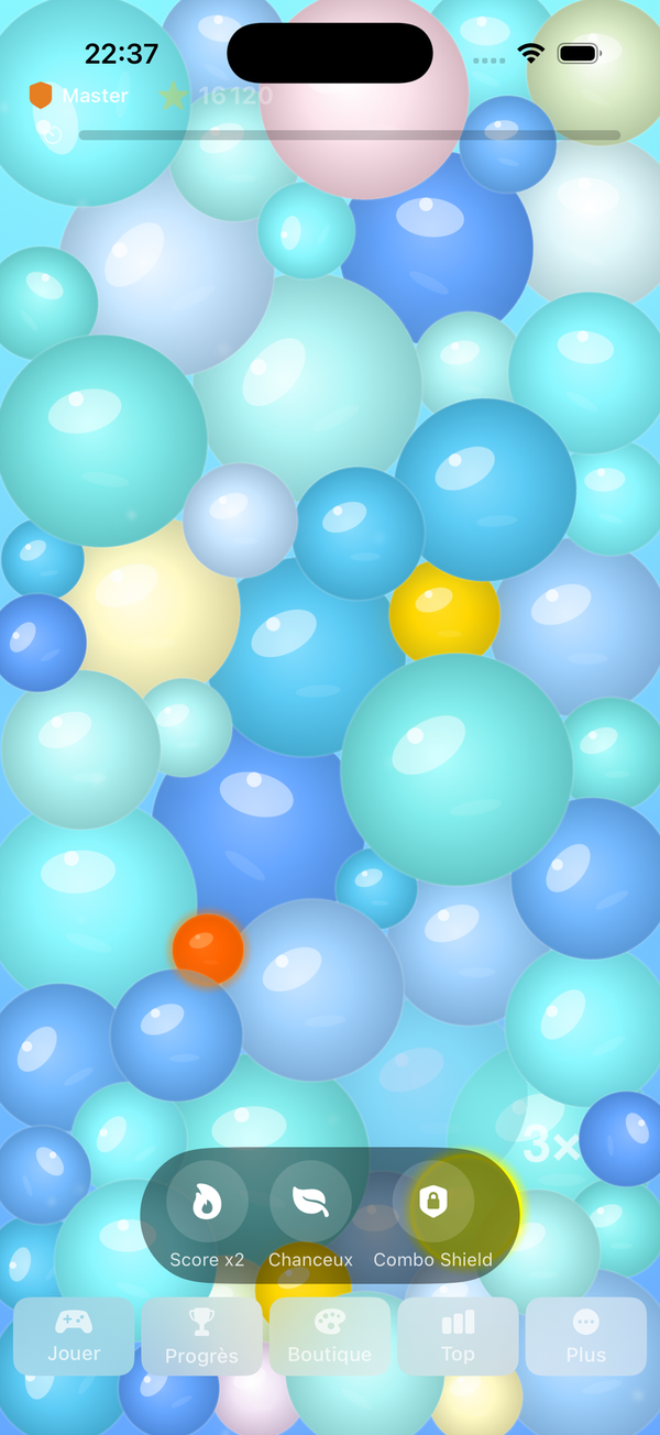 Gameplay PopRelax avec des bulles bleues et jaunes sur fond rose